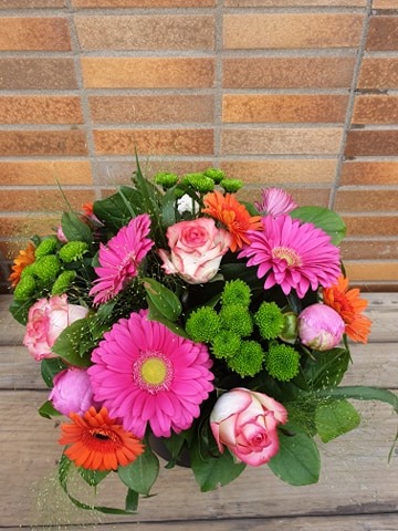 boeket in oranje en fuchsia