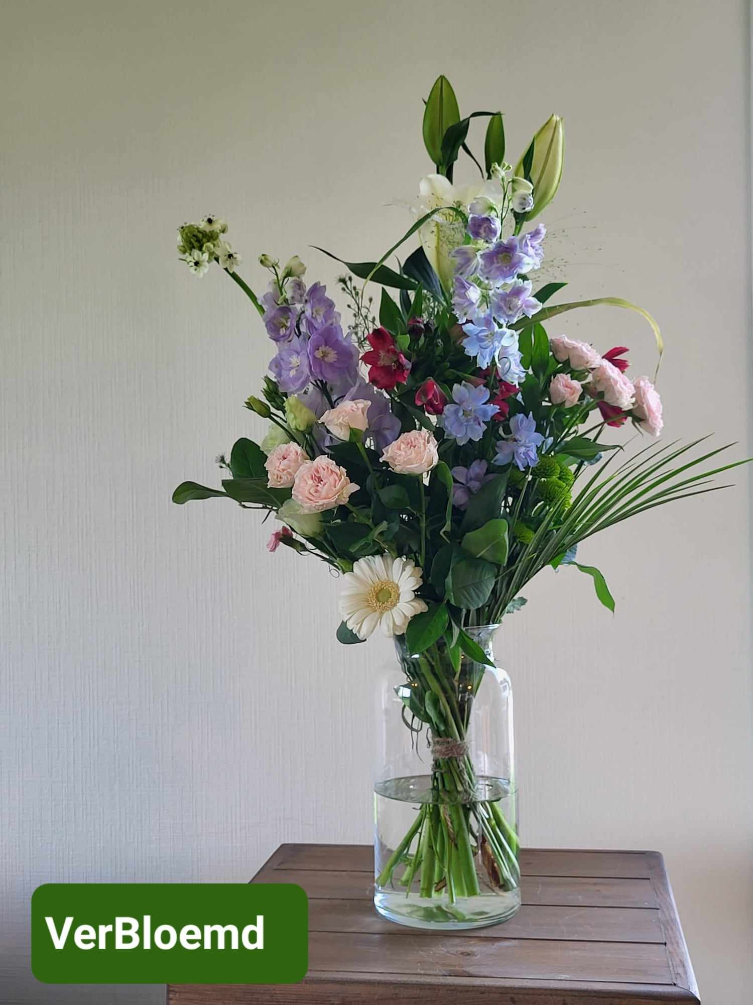 rond bloemstukje voor elke gelehgenheid in oranje tinten